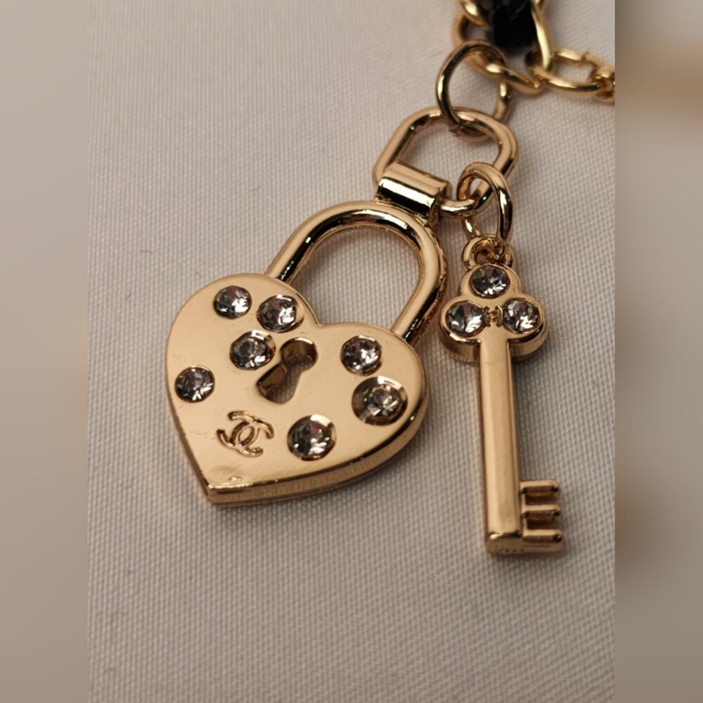 Chanel Gold Black faux leather Chain Bracelet